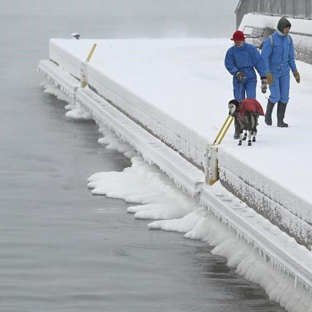 Extreme cold leaves thousands without power in Nordic countries as floods persist in Germany